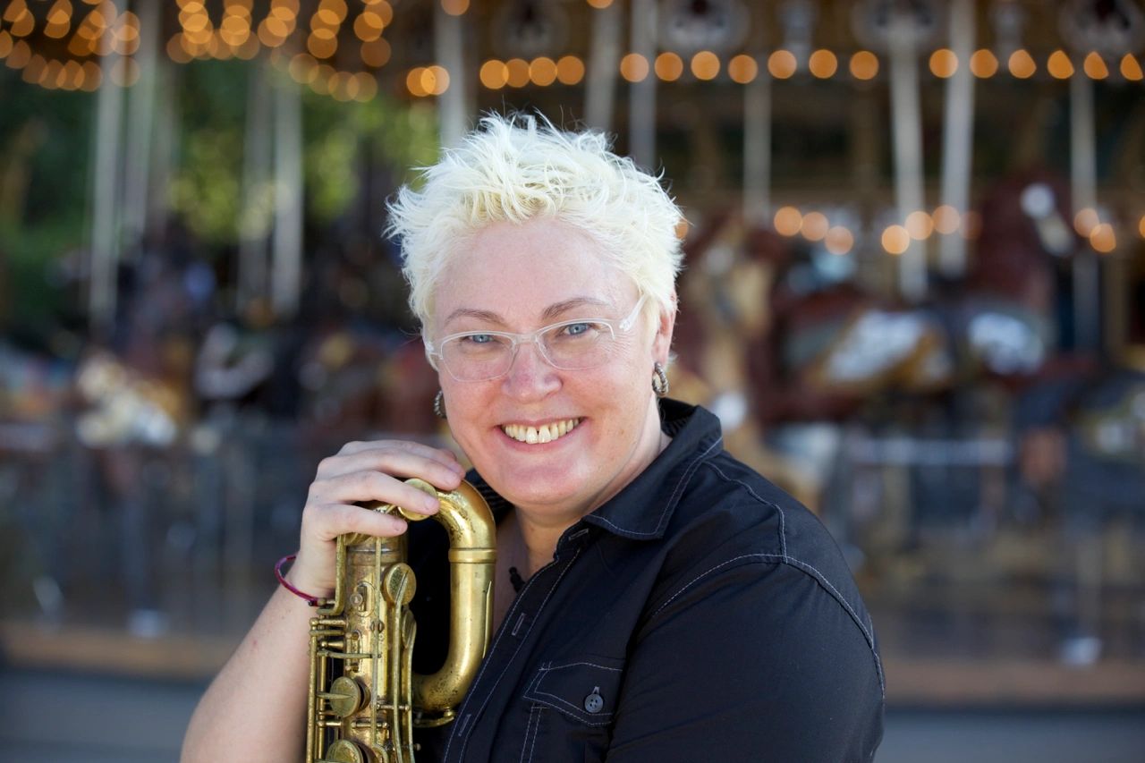 Lisa Parrott in Brooklyn with her baritone saxophone.