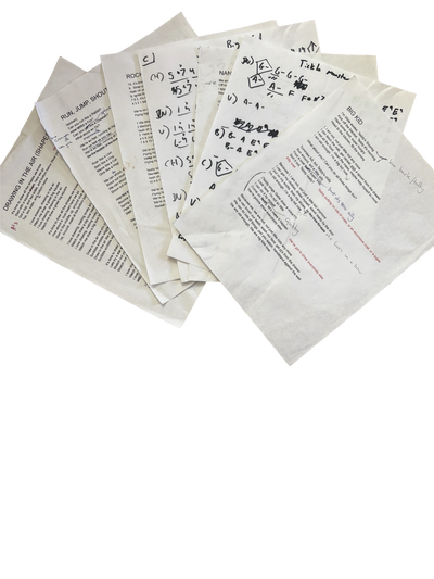 A stack of printed song lyrics and handwritten music notes scattered on a surface.