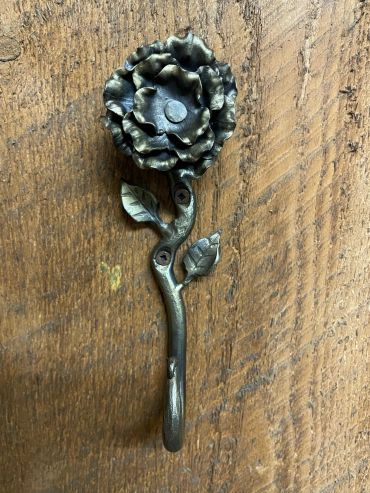 custom hand-forged wrought iron wall hook with decorative flower
