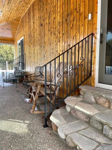 custom wrought iron stair railing for front porch