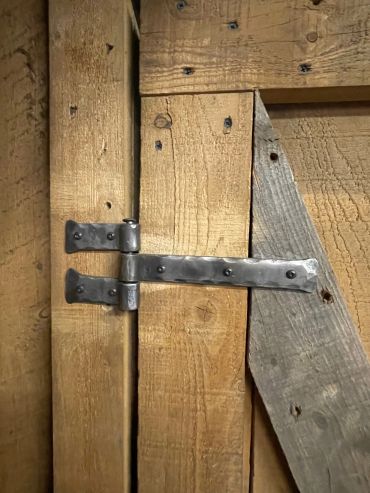 Custom hand-forged wrought iron door hinges