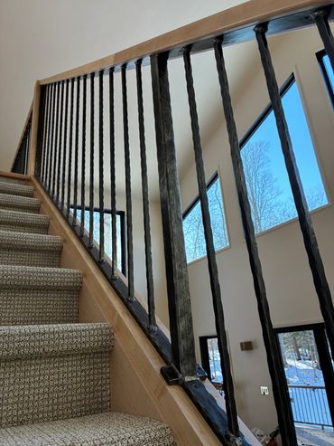 custom railing wrought iron newel post with hammered texture