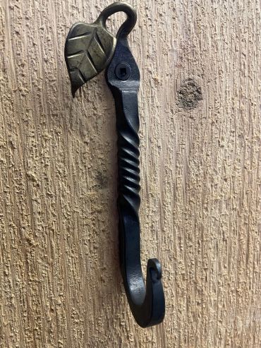 wrought iron hook with hand-forged twist and leaf accent