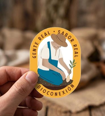 Sticker showing a farmer planting a seed with the text 'Gente Real, Sabor Real, Bioconexión'.