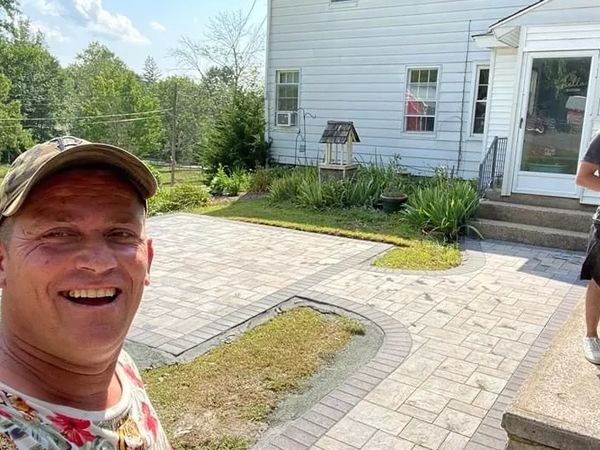 Transform your outdoor space with a stunning bluestone patio, blending beauty and durability.