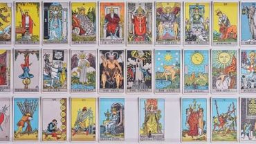 A spread of tarot cards from the Major and Minor Arcana.