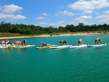 group yoga on water