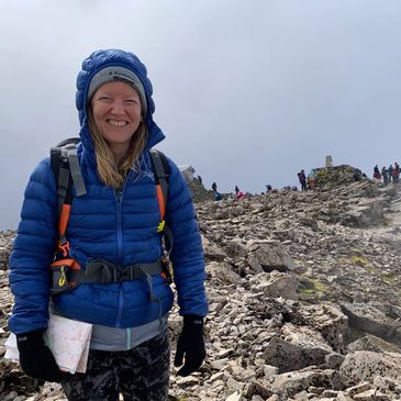 Women in outdoor clothing at the summit of Ben nevis