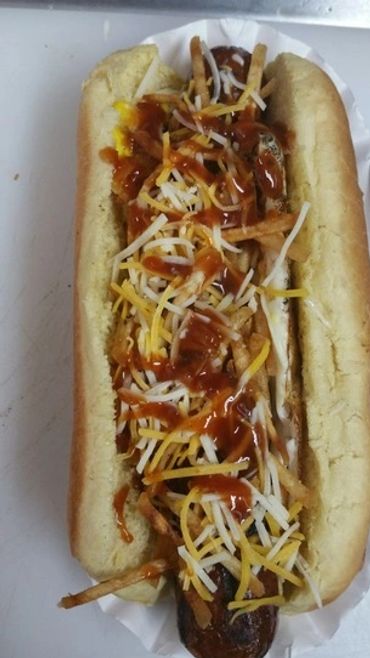 14/lb beef dog topped with potato chip slivers, bacon, cheese, and BBQ sauce