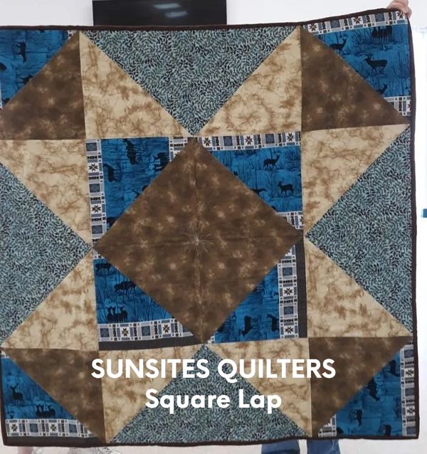 Lap Quilt Designed and pieced by Susan 2.
Blues and Browns.
Size:


