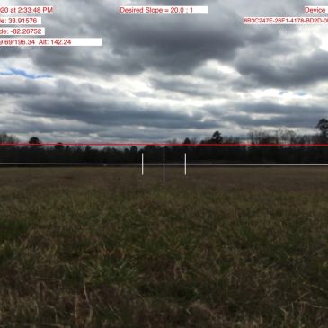 Cloudy sky over grassy field with horizon line and measurement overlays.