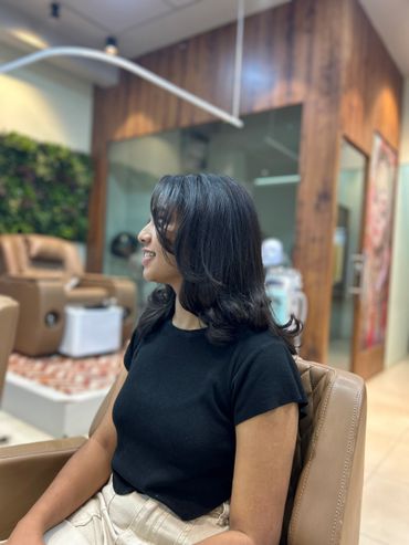 Precision, style, and elegance – redefine your look with a luxury women's haircut at Headlines Salon! ✂️✨