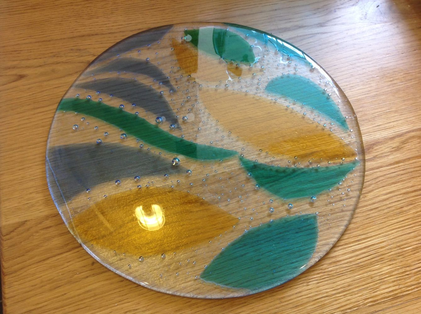 Bowl with green and yellow leaves
