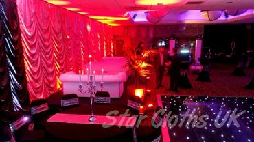 Silver lit red austrian festoon drape