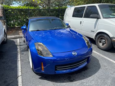 Nissan ceramic coating and paint correction by the loop in Hunters Creek