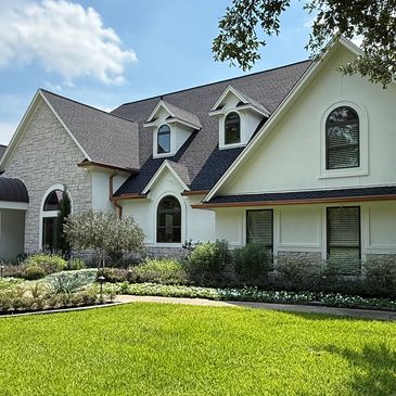 Venetian Glaze on stone and Masonry Flat on stucco applied by DA Paint Service in Houston, Tx.