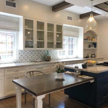 Kitchen cabinets painted by DA Paint Service in Houston, Tx.