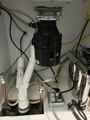 Garbage disposal install by Serrano’s Plumbing Services in Southeast Louisiana.