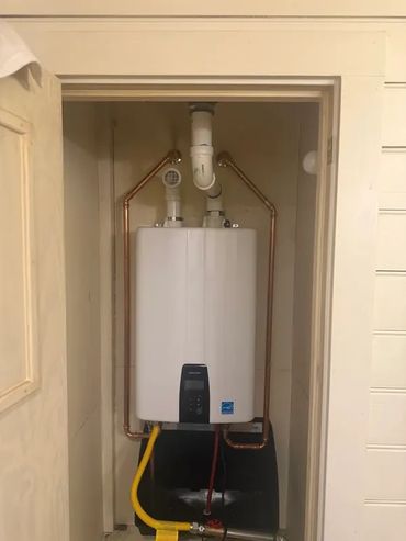 Tank-to-tankless water heater conversion in Southeast Louisiana by Serrano’s Plumbing Services.
