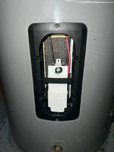 Water heater thermostat service by Serrano’s Plumbing Services.