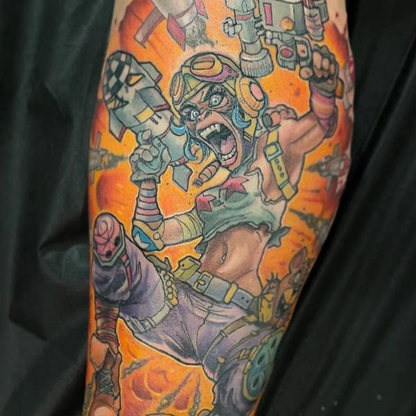 Colorful tattoo from Glen Paradis an animated character wielding weapons amid missiles and explosions.