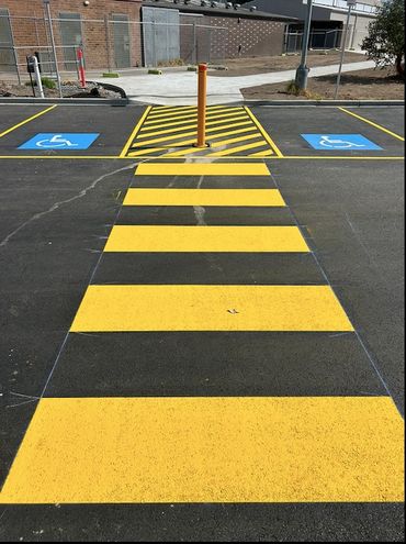Disabled bay, shared zone and zebra pads