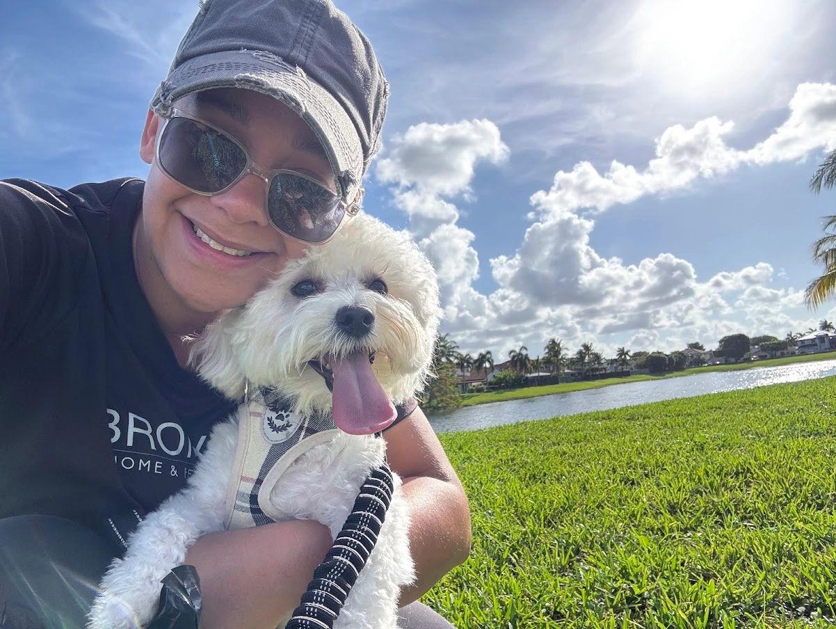 Stephanie, BRONXY'S owner, with Charlie a maltipoo
