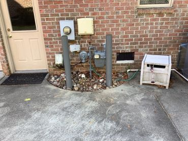 Bollards installed around gas meter
