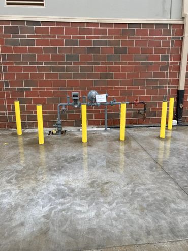 Bollards installed around gas meter