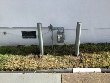 Bollards installed around gas meter