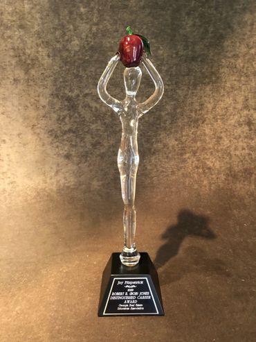 Custom Handblown Glass Teacher of the year award or trophy holding a red glass apple