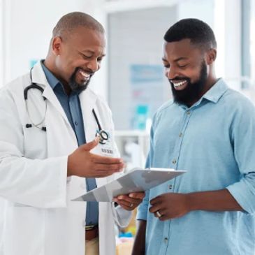 Doctor reviewing chart with patient