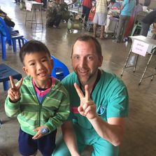 Dr. Richard Stoker with a Thai patient.