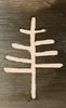 Abstract wooden shape resembling a tree or symbol.