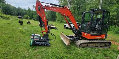 Forestry mulcher attached to our excavator.