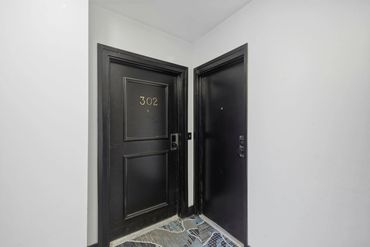 Unit entry: front door and kitchen