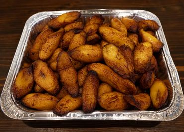 Tray of delicious fried plantains with a caramelized golden-brown crust.