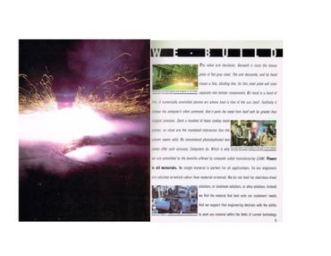 Sparks fly from a robot arm cutting steel with a plasma arc in a manufacturing setting.