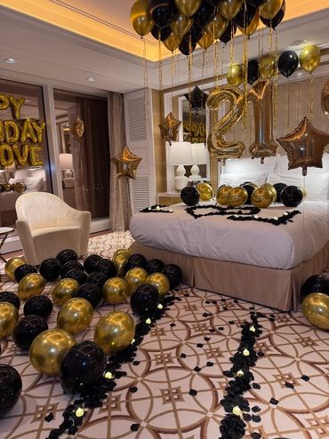 a hotel room decorated for a 21st birthday party in the city of boston