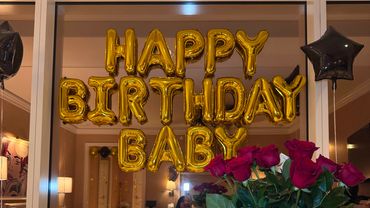 a balloon display in a decorated hotel room in the city of boston
