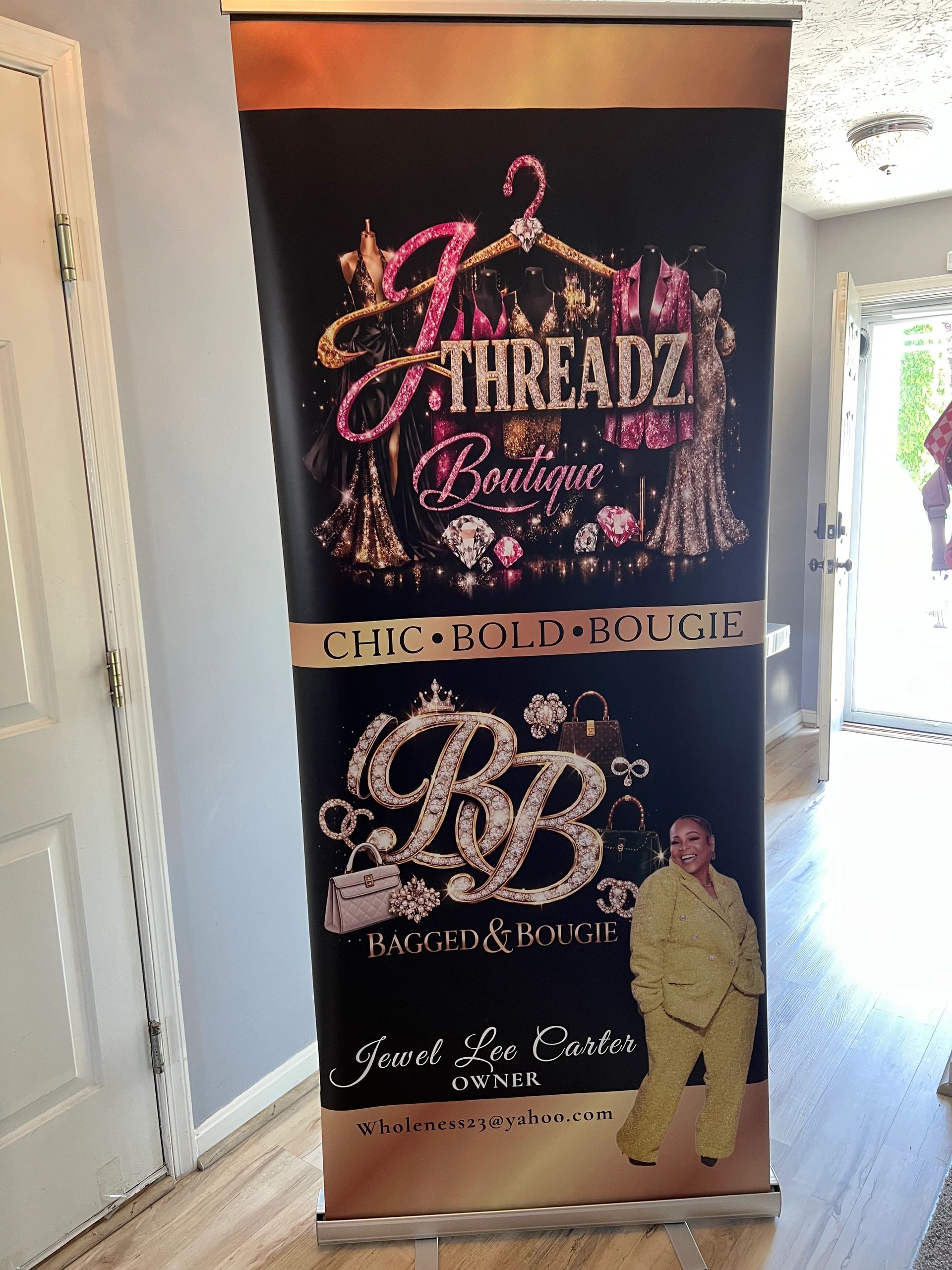 J Threadz Boutique banner showcasing chic fashion and owner Jewel Lee Carter.