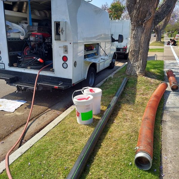 Re-lining a sewer line to like new condition with only top line equipment and materials.
