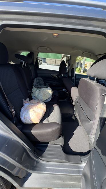 auto interior detailing with shampoo and vacuum