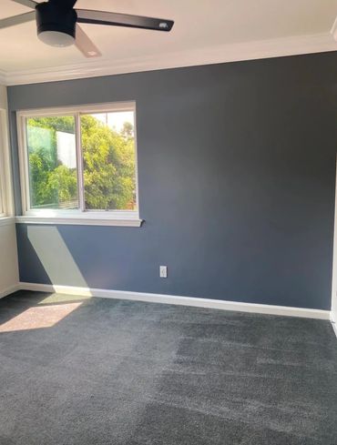 Painted bedroom with clean trim lines in Yorba Linda