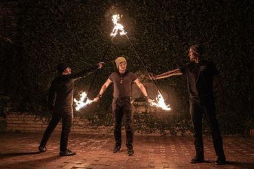 Fire performers doing a team effort