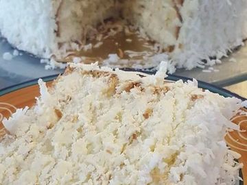 White Layers brushed with coconut rum, 
filled and iced with coconut rum buttercream