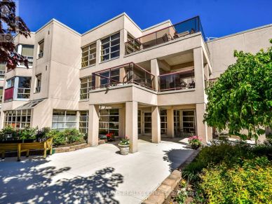 Modern multi-story residential building with balconies.