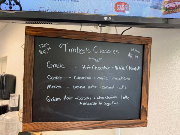Chalkboard menu of Timber's Classics with drink options and prices.