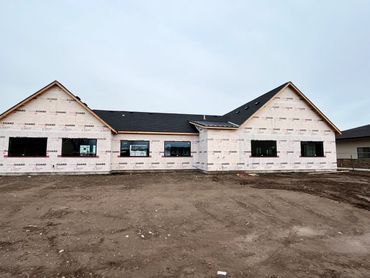 New office under construction with the new roof completed