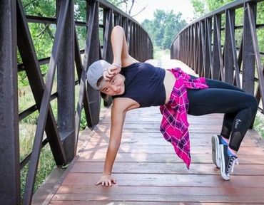 Hip hop dancer wearing recycled dance costume.